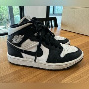 Black & white Nike Jordans